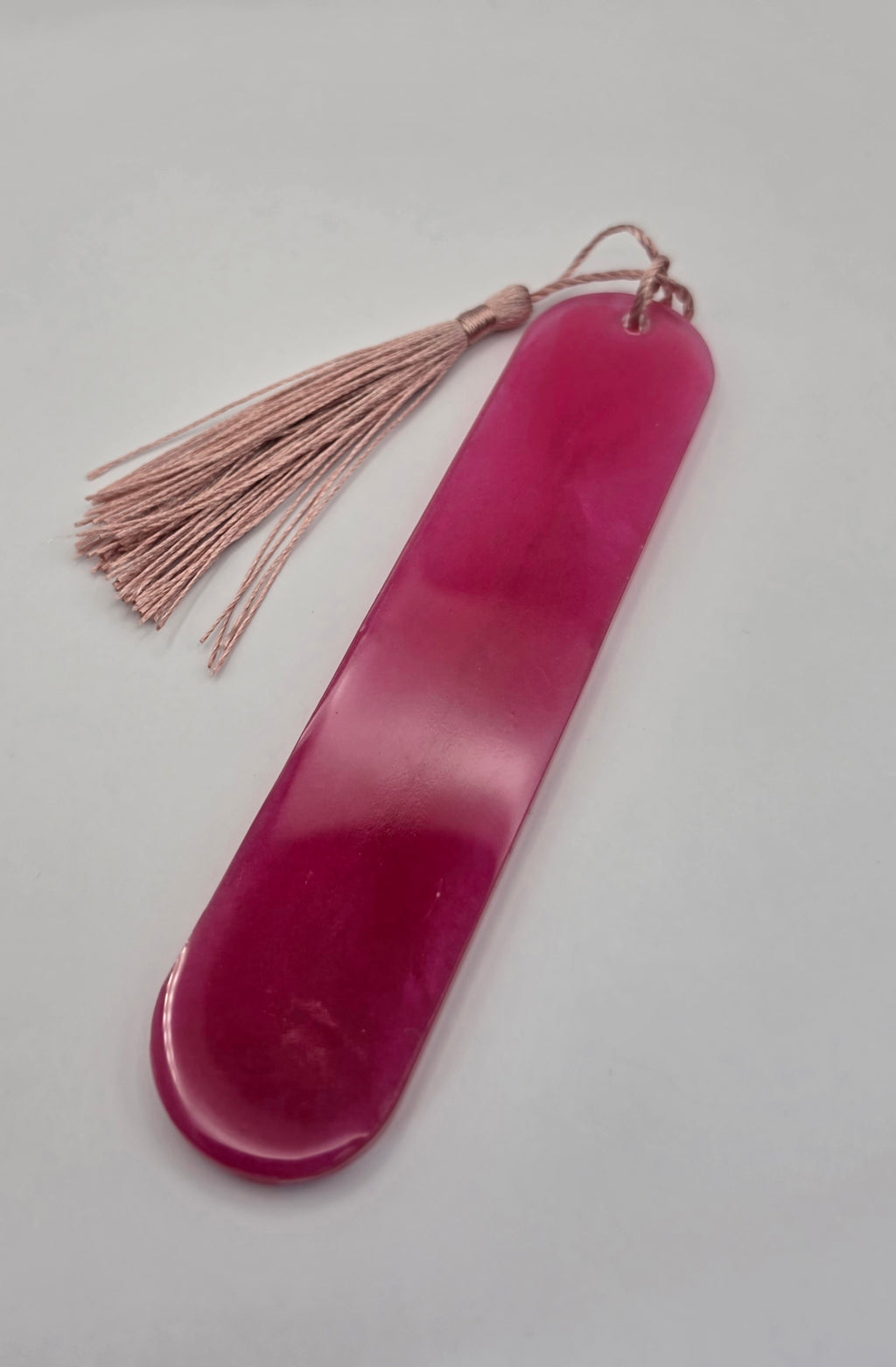 Bokmerke rosa og hvit